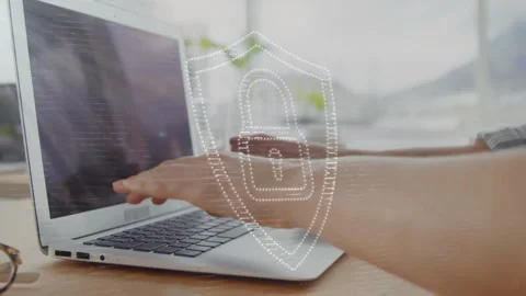 Typing woman's hands pressing laptop keys at sunlit desk by window, with red Stock Footage 331062715