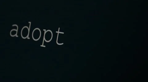 Typing word adopt Stock Footage 45707794