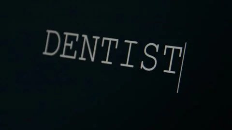 Typing word dentist Stock Footage 45855690