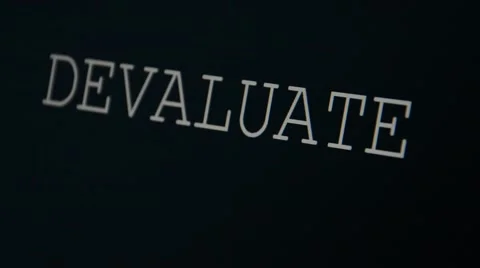 Typing word devaluate Stock Footage 45855765