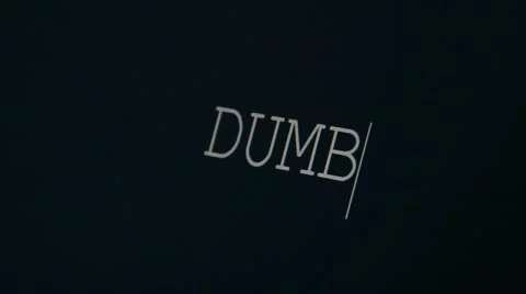Typing word dumb Stock Footage 45875629