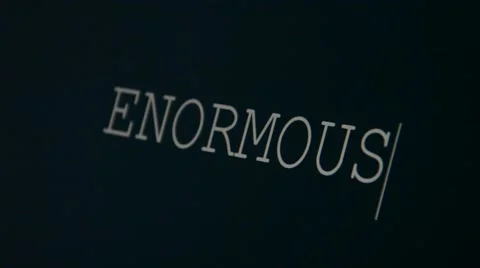Typing word enormous Stock Footage 45901265