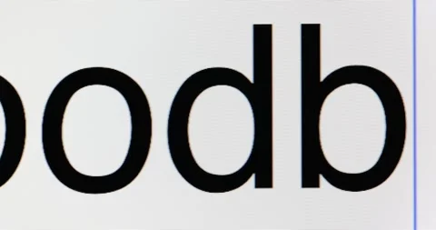 Typing word Goodbye on computer displayed in large bold type Stock Footage 277686441