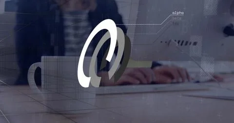 Typing worker wearing blazer at desk with mug, keyboard, monitor and 3D swirl Stock Photos