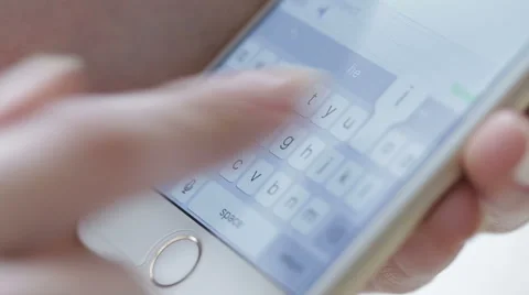 Typing/texting a message on a smartphone. send a message. close-up Stock Footage 60382416