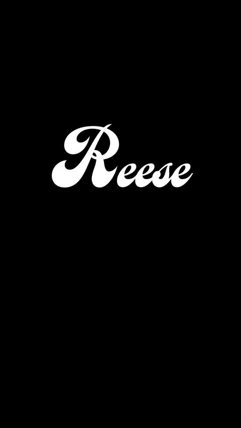 A typographic animation the name Reese in white cursive on black background Stock Footage 339436650