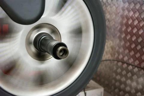 Tyre spinning on the balancing machine Stock Photos