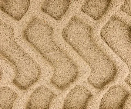 Tyre tracks in sand Stock Photos