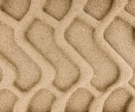 Tyre tracks in sand Stock Photos