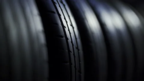 Tyres in row background video Stock Footage 138806287