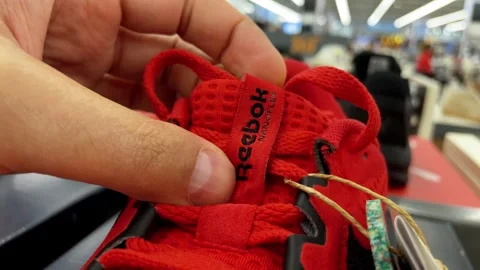Tyumen, Russia-June 14, 2023: Reebok sneakers shoes close-up for sports. Buying Stock Footage 244452853
