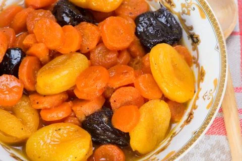 Tzimmes, tsimmes, stewed sweet carrots with dried fruit Stock Photos