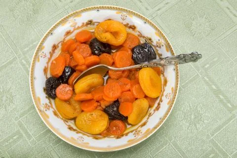 Tzimmes, tsimmes, stewed sweet carrots with dried fruit Stock Photos