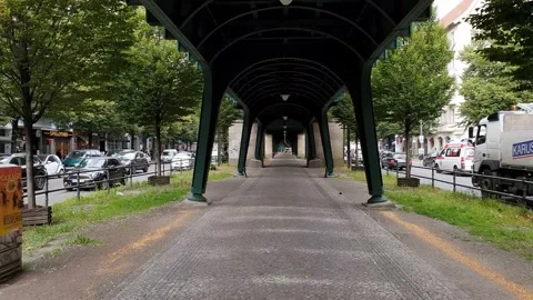 U-Bahn train rapid transit railway. Elevated railway above the street. Stock Footage 168965941