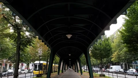 U-Bahn train rapid transit railway. Elevated railway above the street. Stock Footage 168966028