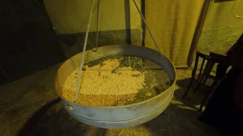 U crivu an ancient tool to sift the flour and separate it from unfiltered waste Video stock 297586934