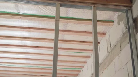 U-profile construction for a plasterboard frame partition. The ceiling of a Stock Footage 235421690