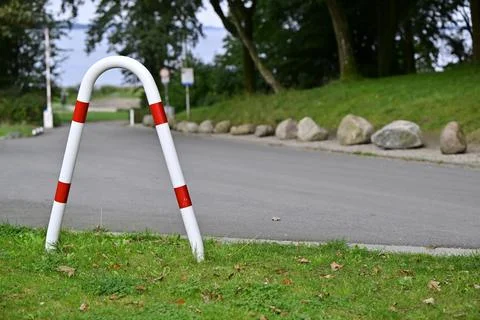 U-Shaped Barrier Post by the Roadside Stock Photos