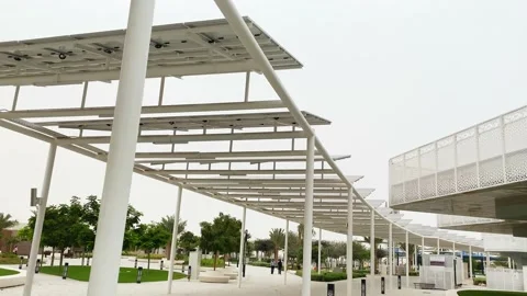 UAE, Abu Dhabi - 13th march, 2023: pedestrians walk in Masdar city central .. 動画素材 237986828