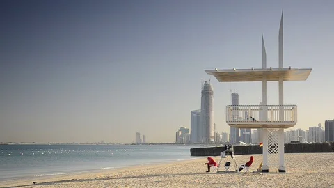 UAE, Abu Dhabi, Beach, Lifeguards and Skyline Stock Footage 77273718