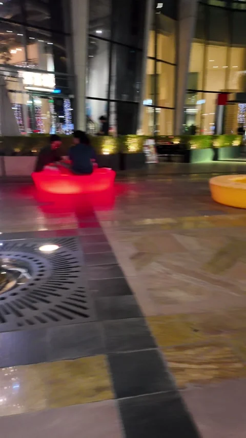 UAE - August 19, 2026 - People roller skating and parked rental e-scooters .. 動画素材 342730570
