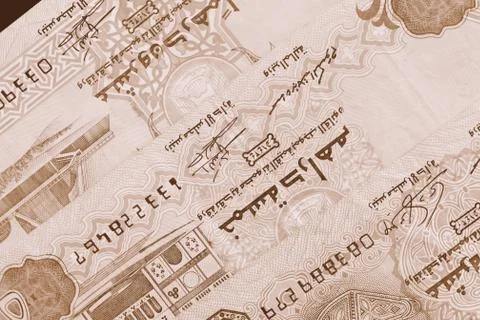 UAE dirham currency background close up. Brown color toned Stock Photos