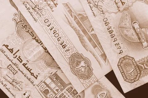 UAE dirham currency background close up. Brown color toned Stock Photos