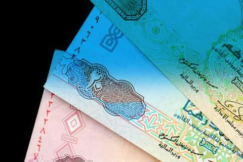 UAE dirham currency notes close up. Money background blue color toned Foto stock