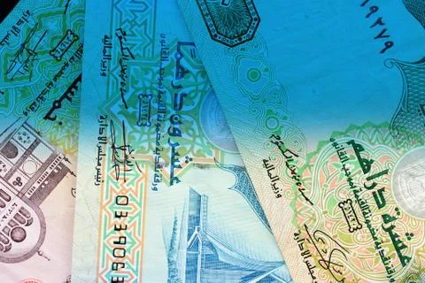 UAE dirham currency notes close up. Money background blue color toned Foto stock