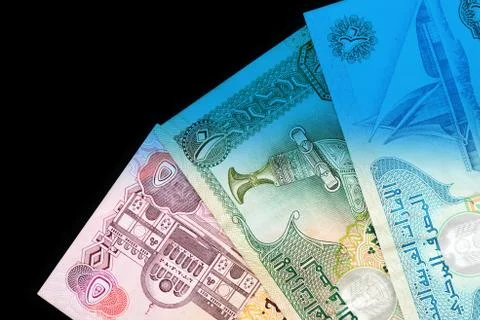 UAE dirham currency notes close up. Money background blue color toned Foto stock