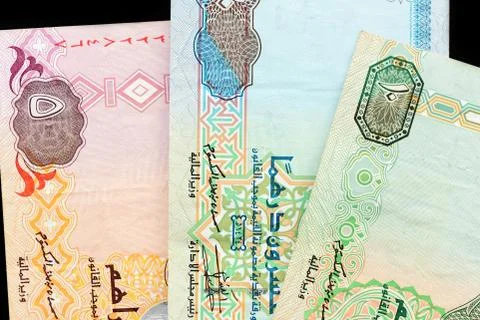 UAE dirham currency notes on a dark background close up Foto stock