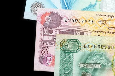 UAE dirham currency notes on a dark background close up Foto stock