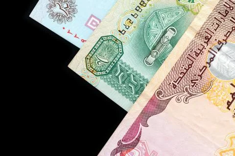 UAE dirham currency notes on a dark background close up Foto stock
