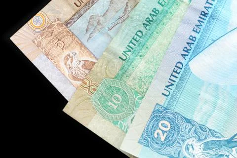 UAE dirham currency notes on a dark background close up Foto stock