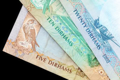 UAE dirham currency notes on a dark background close up Foto stock