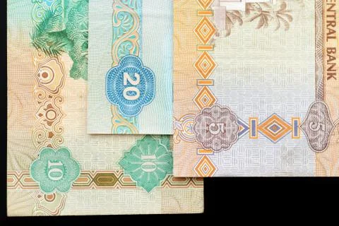 UAE dirham currency notes on a dark background close up Foto stock