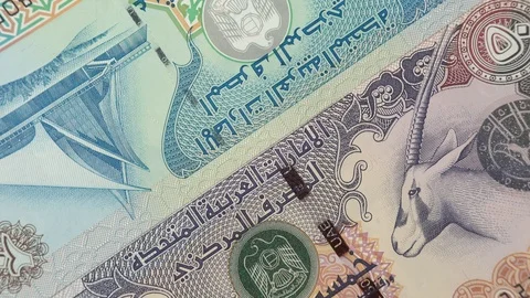 UAE dirham notes rotating. Emirates currency, money Stock Footage 105530500