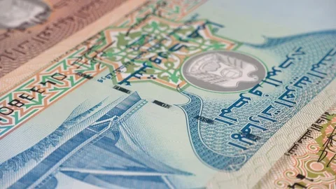 UAE dirham notes slow rotating. Emirates money currency. Low angle Stock Footage 102234928