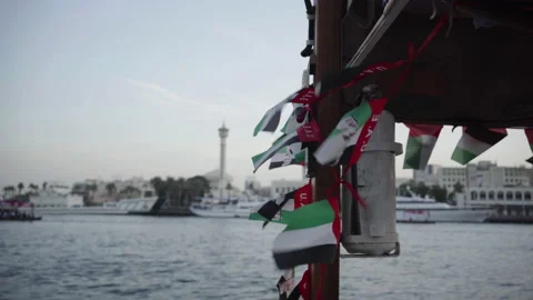 UAE, Dubai. 12.12.2020 UAE flags attached to the boat fluttering in the wind Stock Footage 161856765
