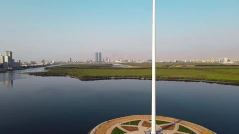 UAE flag and Ras al Khaimah emirate in the north United Arab Emirates aerial  스톡 동영상 154534619