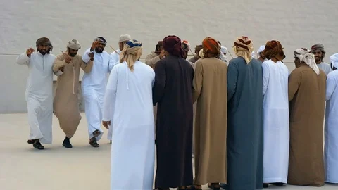 UAE Men performing a traditional dance - Middle Eastern Culture Stock Footage 111896513