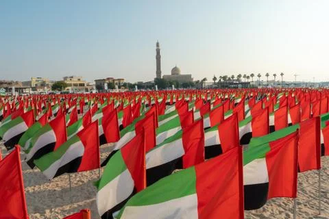 UAE National day celebration with flags around city in Dubai Stock Photos