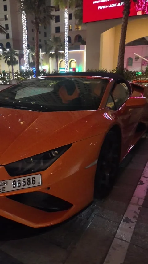 UAE, September 10, 2026: Luxury and exotic supercars parked at night⁠ Stock Footage 345180691