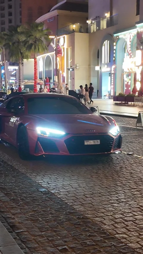 UAE, September 10, 2026: Luxury and exotic supercars parked at night⁠ Stock Footage 345181523