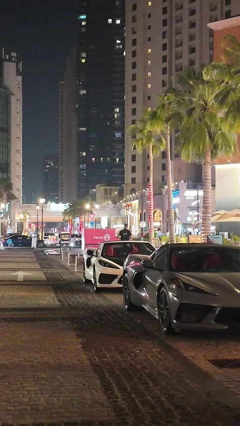UAE, September 10, 2026: Luxury and exotic supercars parked at night⁠ 動画素材 345181555