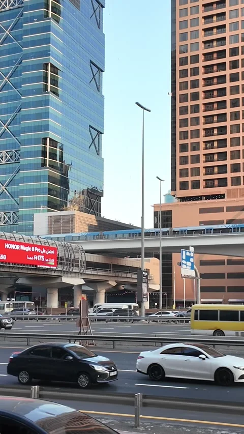 UAE - September 18, 2026 - Dubai Metro and Tram transit system, stations, a.. Stock Footage 345808370