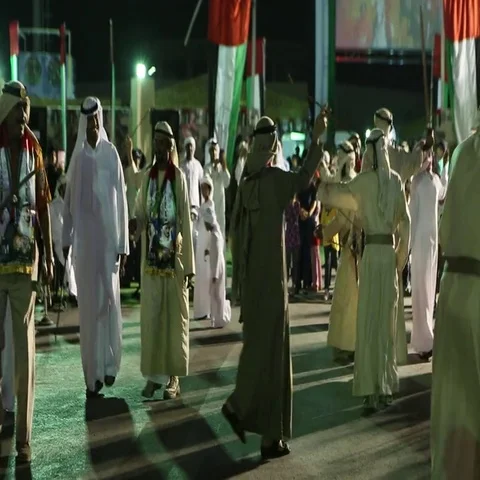 UAE stick dancers performing during UAE National Day celebration at Dubai, Stock Footage 69495834