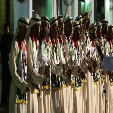 UAE stick dancers performing during UAE National Day celebration at Dubai, Stock Footage 69496193