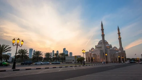 UAE - Sunset Over Mosque and Skyline - 4K Timelapse Video stock 112738671