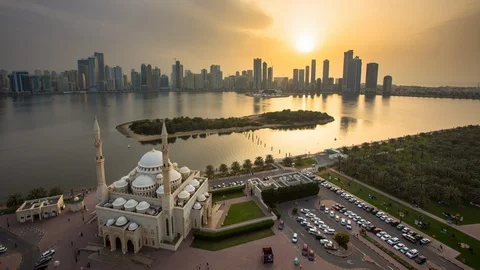 UAE - Sunset over Skyline and Mosque - 4K Timelapse Stock Footage 112749502